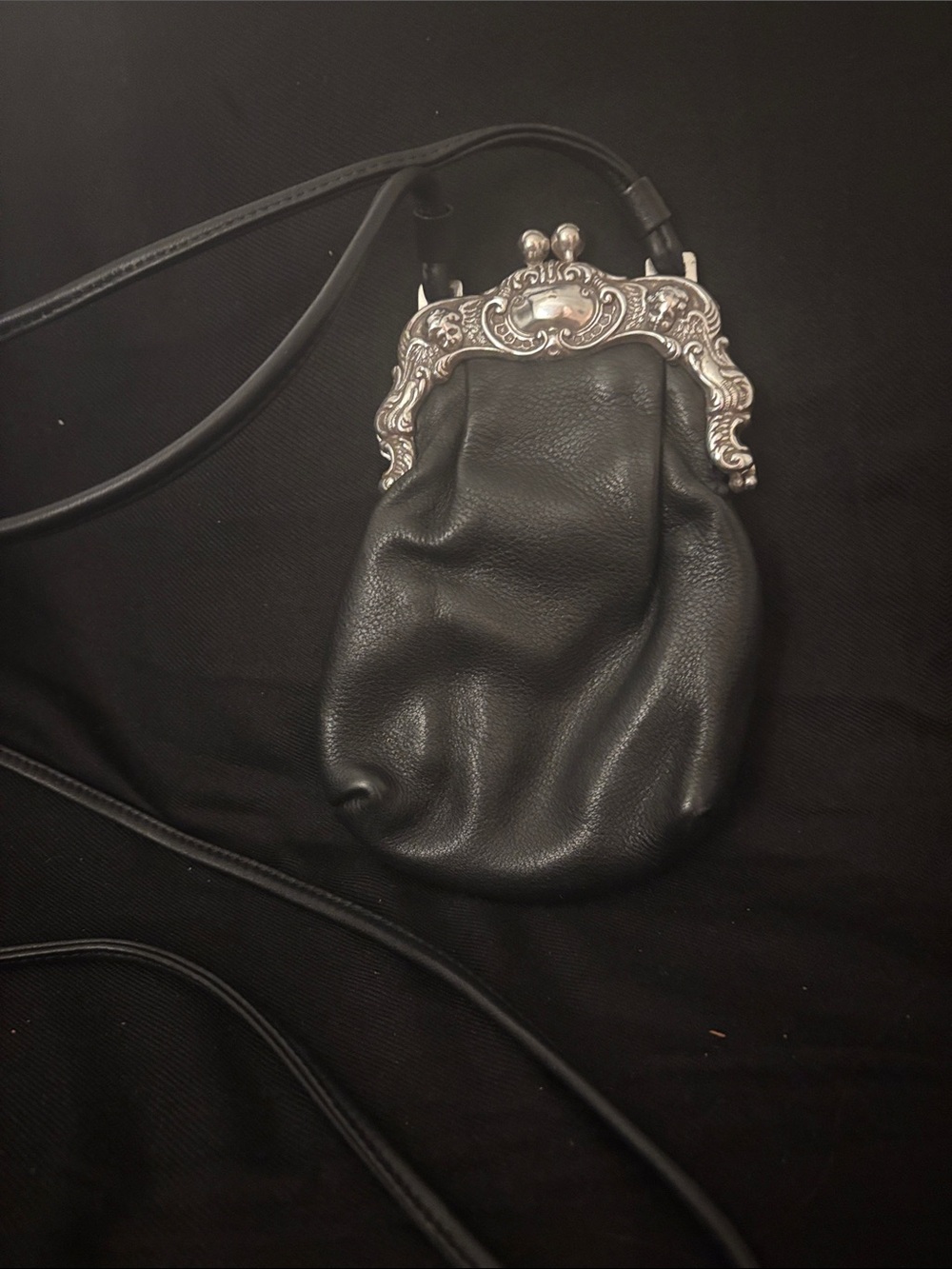 Black Leather Crossbody Bag with Ornate Silver Frame